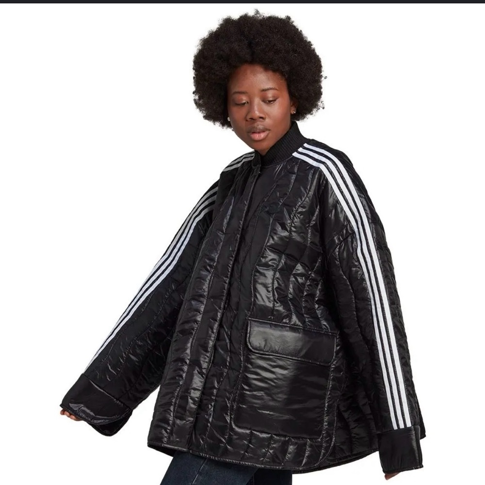 Nearly new lightweight adidas Black Puffer Jacket with White Stripes.